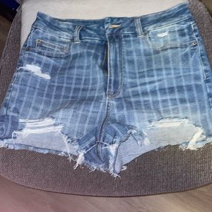 Distressed striped jean shorts
